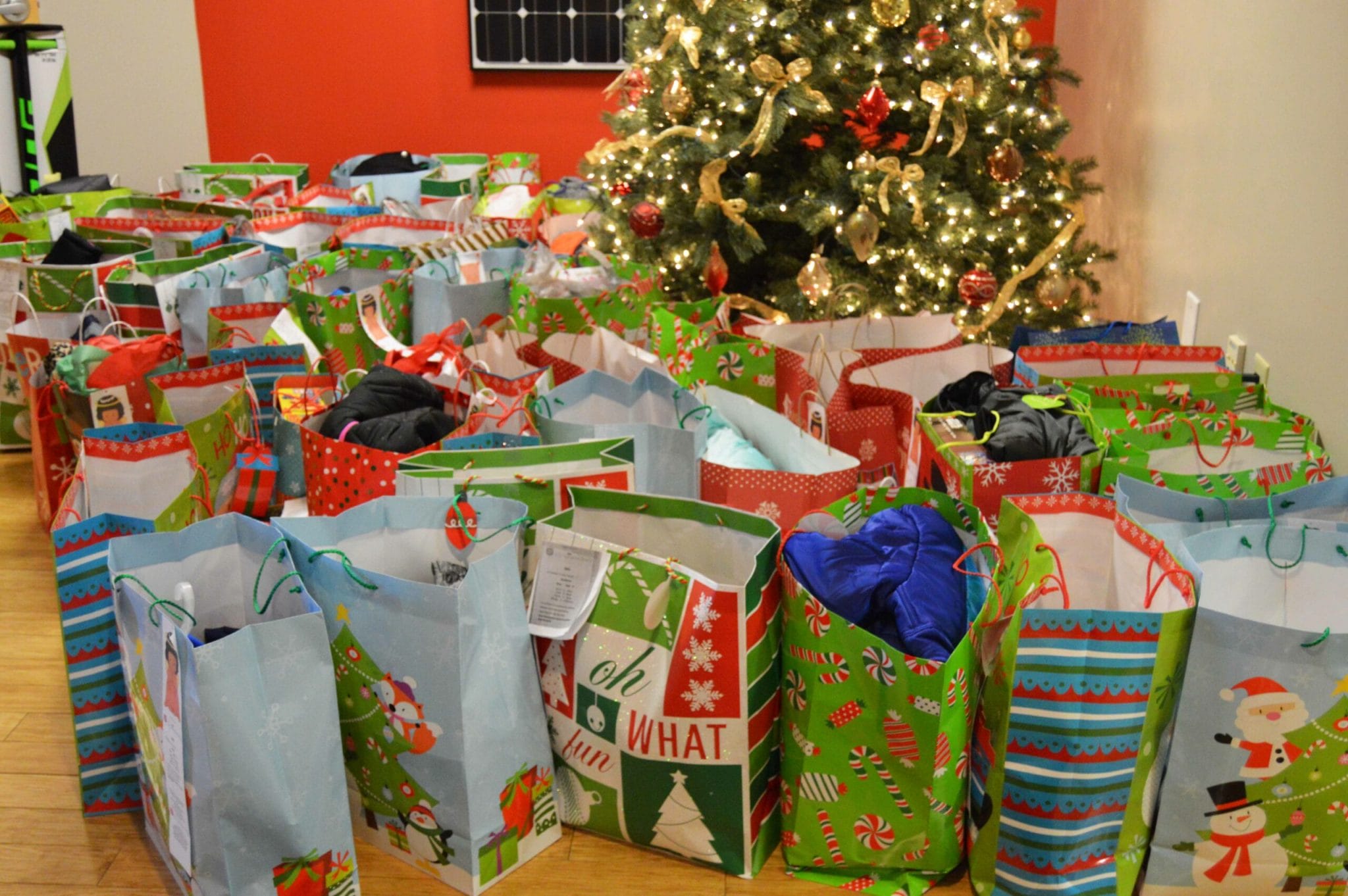Resource Box Header Strata Team “Adopts” 125 Children for Holiday Gifts